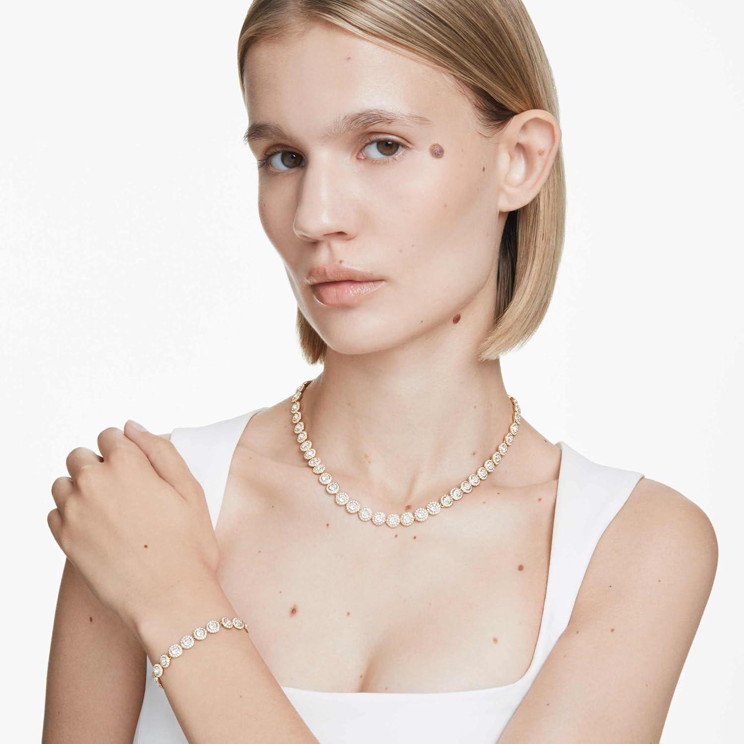 imageSwarovski Una Angelic set Round cut clear Goldtone finish