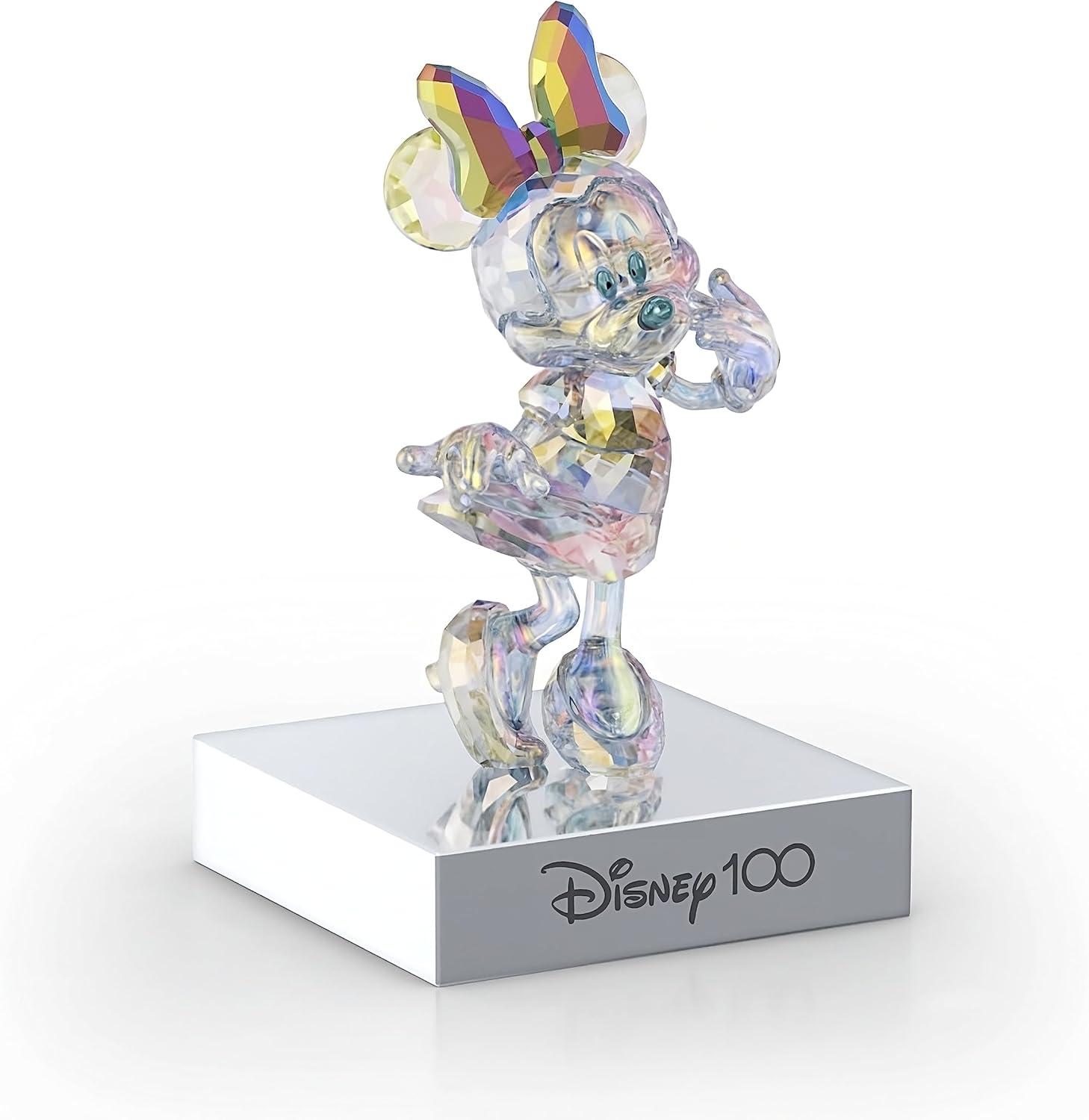 imageSwarovski Disney100 Minnie Mouse Figurine Multiple Facets in Aurora Borealis Color Effect Part of The Disney100 CollectionMinnie Mouse
