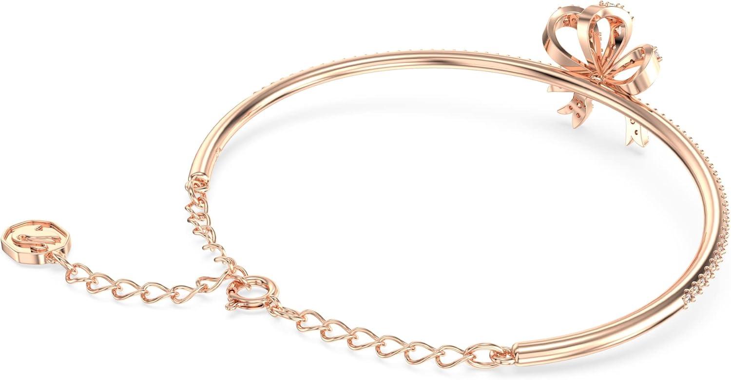 imageSwarovski Volta Necklace Earrings and Bracelets Jewelry Collection BowInspired Pink and Clear Crystals with RoseGold Tone FinishBangle