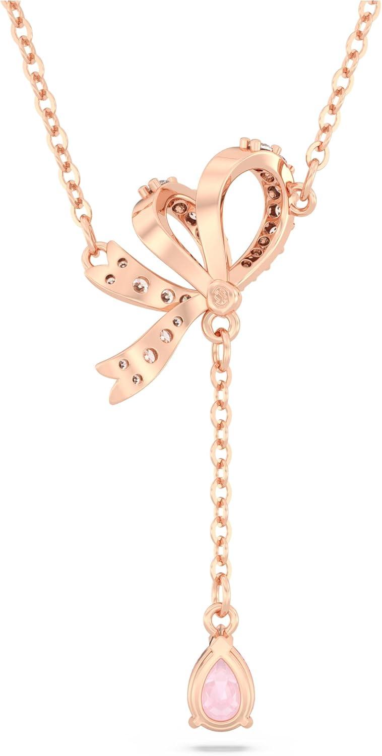 imageSwarovski Volta Necklace Earrings and Bracelets Jewelry Collection BowInspired Pink and Clear Crystals with RoseGold Tone FinishY Pendant Necklace
