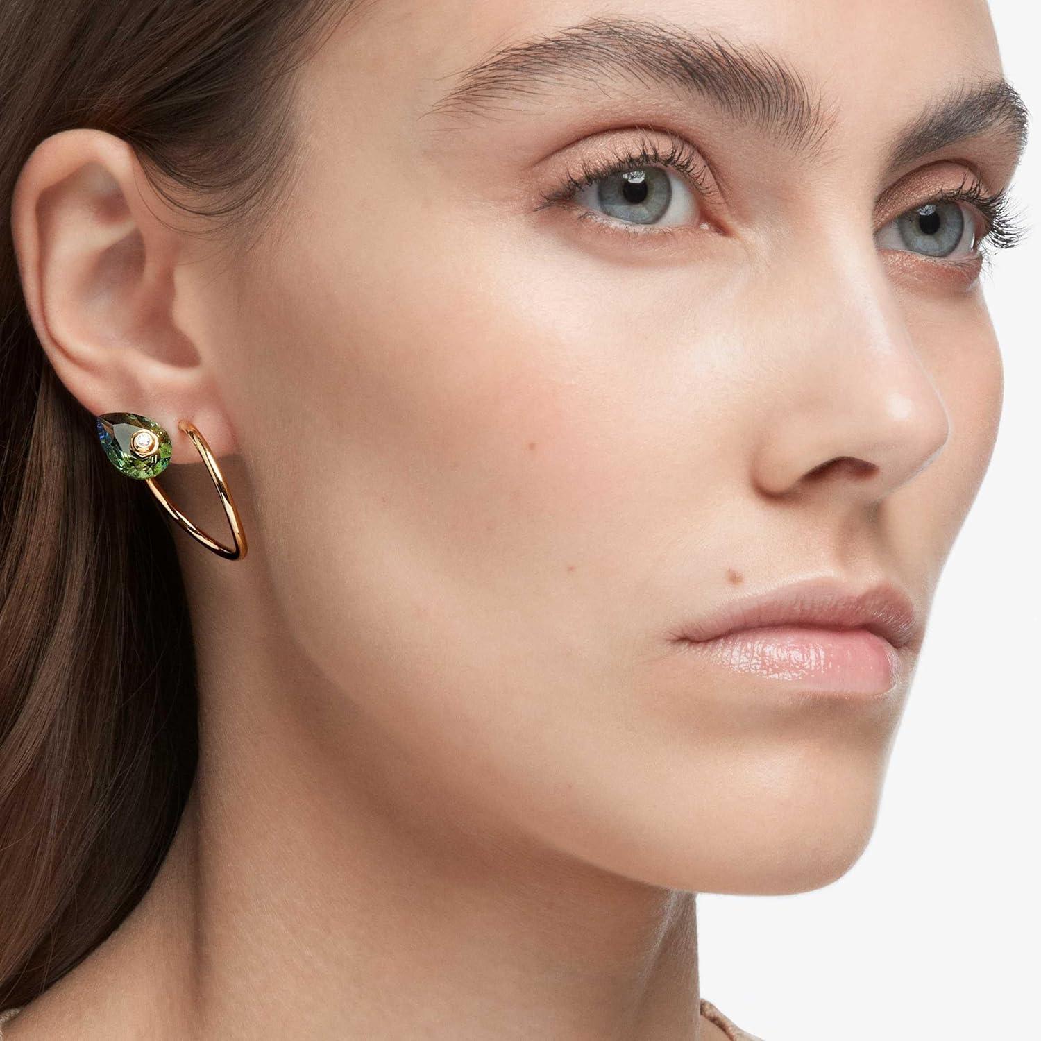 imageSwarovski Numina Earring Jewelry Collection Gold Tone Finish Green Crystals Clear CrystalsAsymmetrical Earrings
